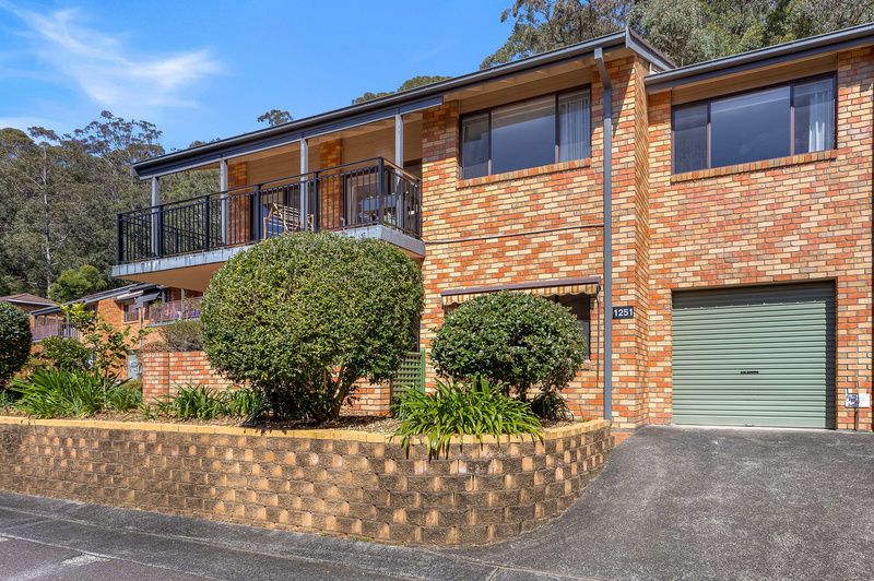 Expansive Three-Bedroom Home with Courtyard and Patio