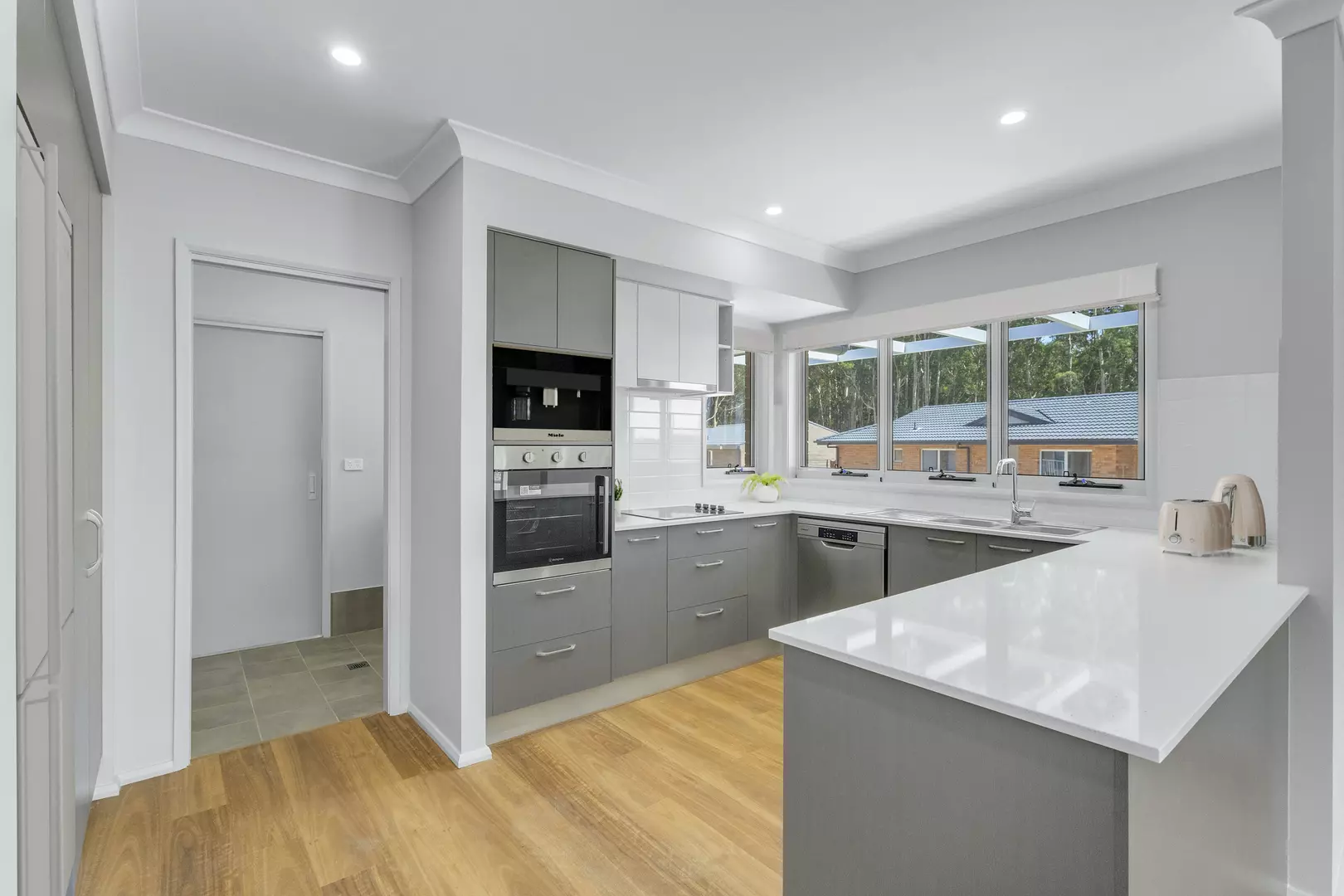 Type A with Left Garage: Relax in a Sunlit 2-Bedroom Villa