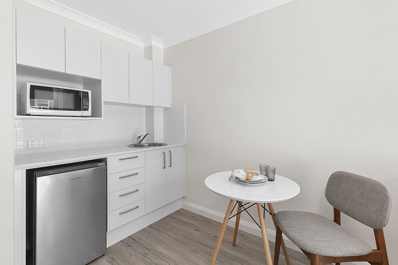 Fully refurbished one bedroom serviced apartment with separate bedroom and ensuite plus kitchenette and balcony.