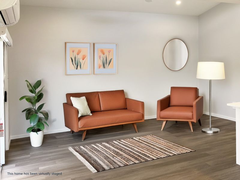 Opposite green space, on a corner lot