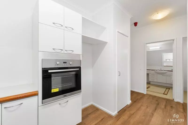 UNDER OFFER. Light-filled, Ground Floor Apartment with Wrap-Around Courtyard