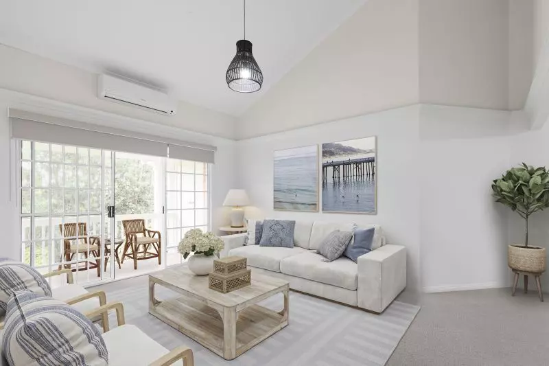 Immaculately maintained upper-level unit with district views and easy access ramp.