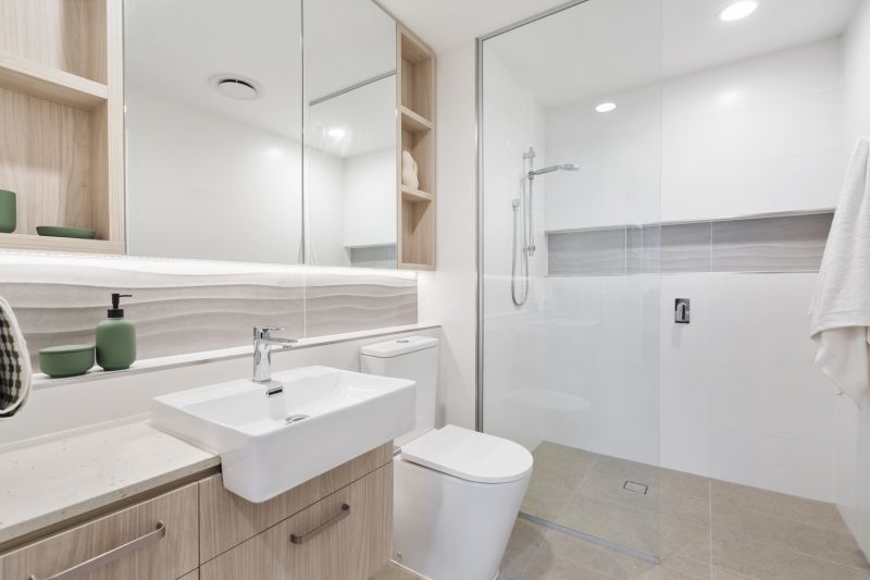 Elegant two-bedroom apartment with peaceful, tree-lined outlooks