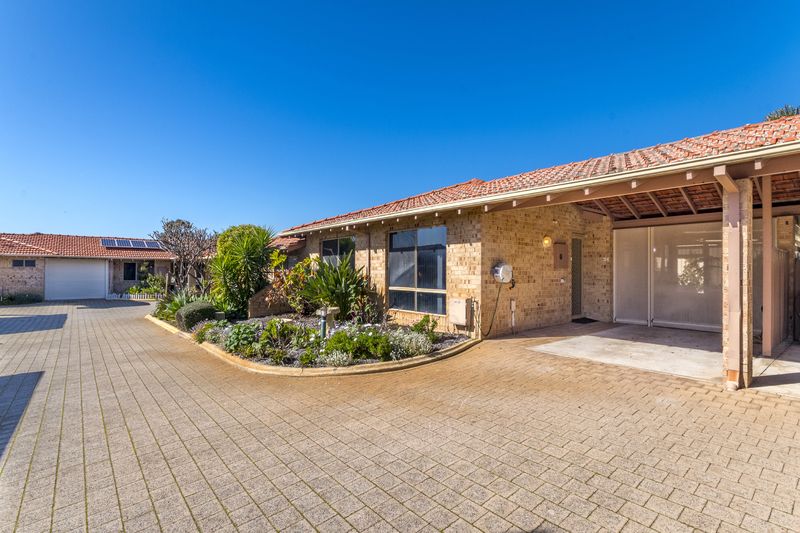 Sunny Yard and Vibrant Village Lifestyle