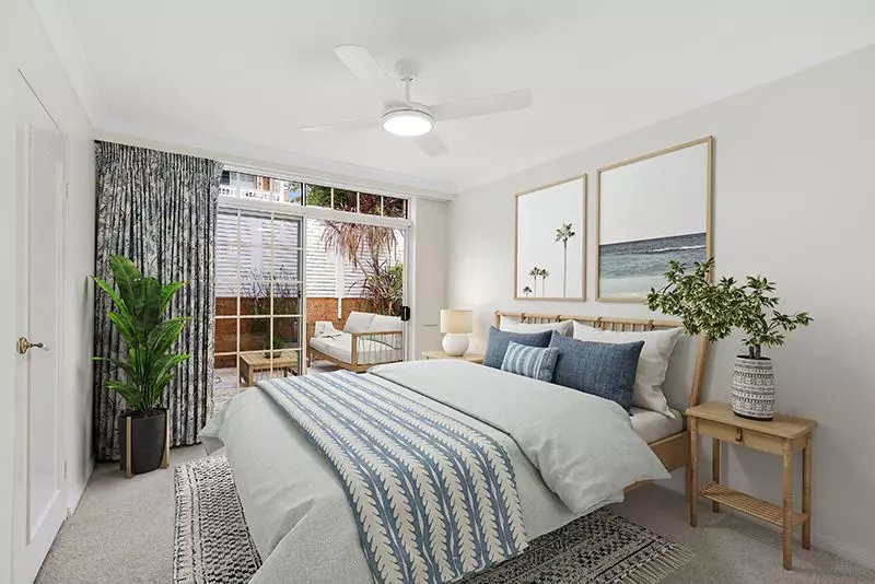 Elegantly renovated ground floor unit overlooking beautiful gardens close to clubhouse.