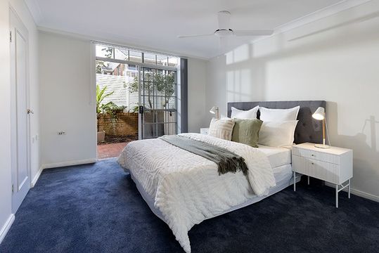 Perfectly located, renovated ground floor unit with surrounding gardens.