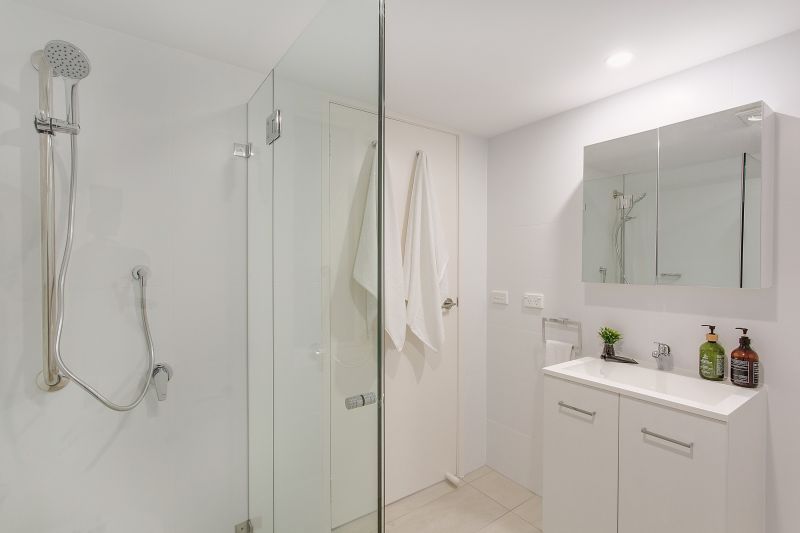 Serene two-bedroom haven overlooking lush forest