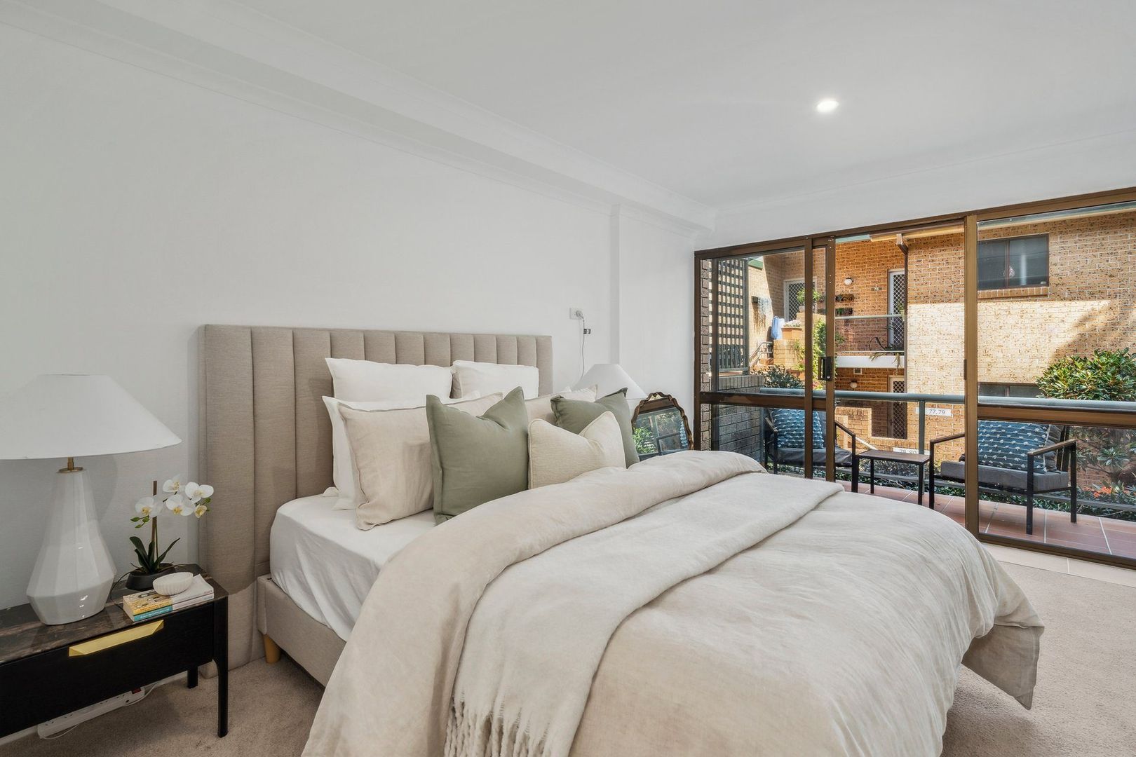 A serviced apartment surrounded by garden greenery
