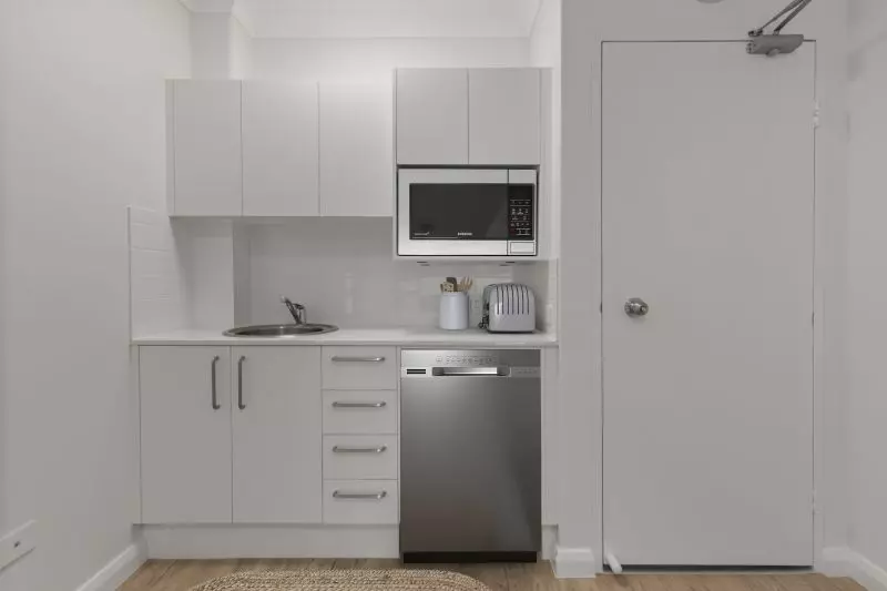 Beautifully renovated one bedroom serviced apartment with sunny, private courtyard.