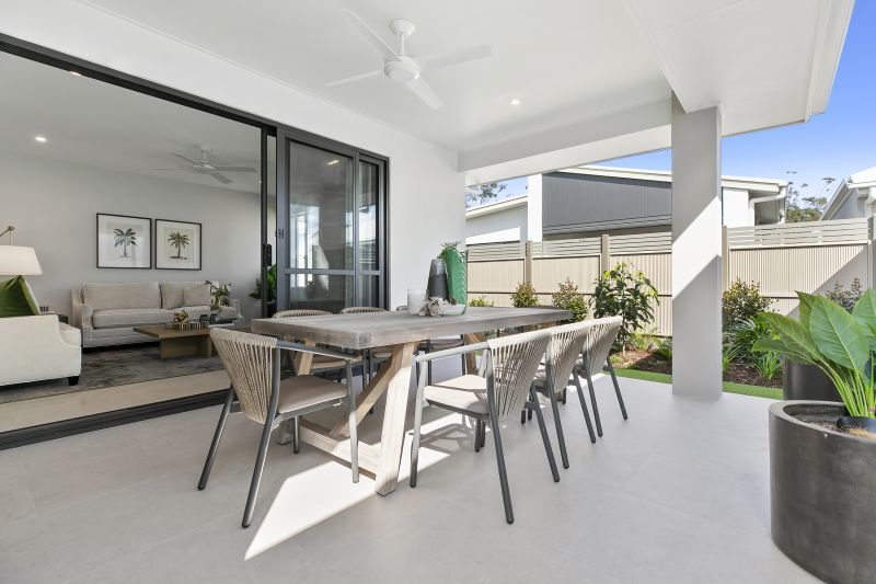 STUNNING DISPLAY HOME FACING TRANQUIL LAKE