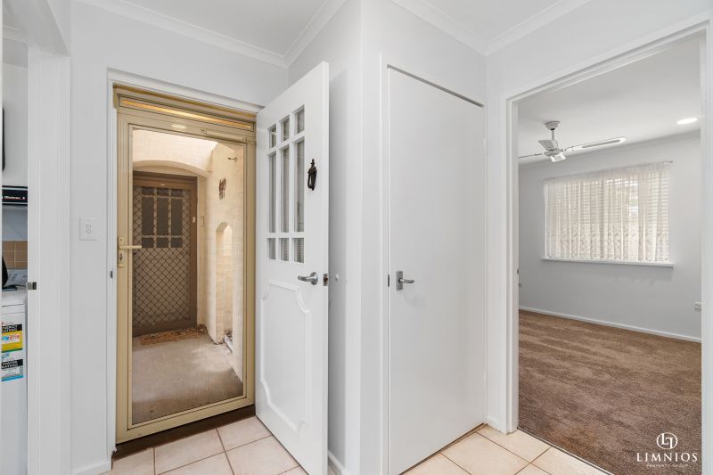 SOLD! A bright, light filled unit with a sunroom and leafy outlook