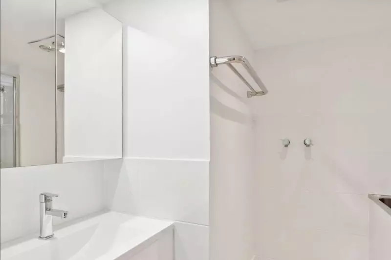 Charming two-bedroom apartment surrounded by lush greenery