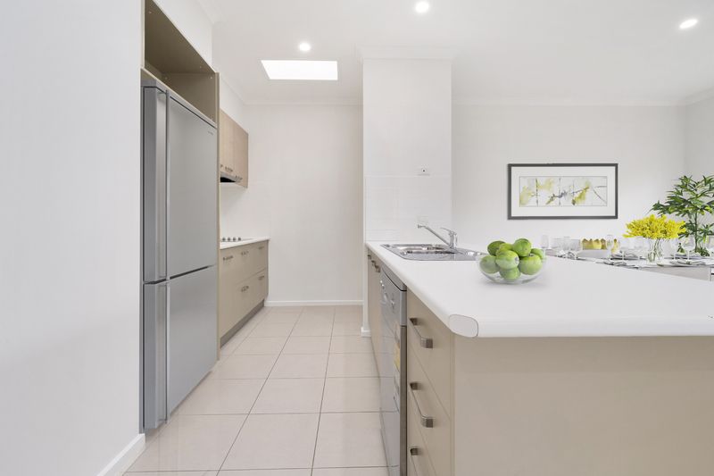 Spacious, Light-Filled Unit with Private Backyard and Prime Location