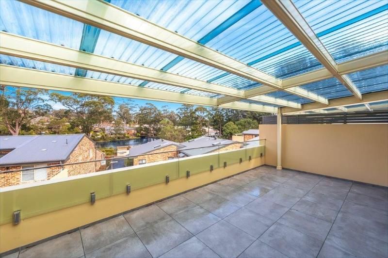 Stylish, Upgraded Waterfront Villa with Spacious Outdoor Entertaining Area