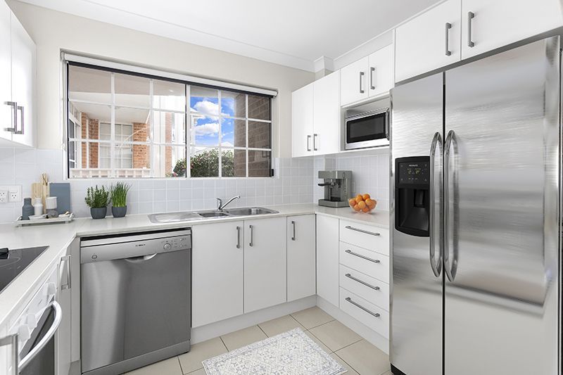 Perfectly maintained ground floor unit nestled amongst the gorgeous gardens and close to the clubhouse