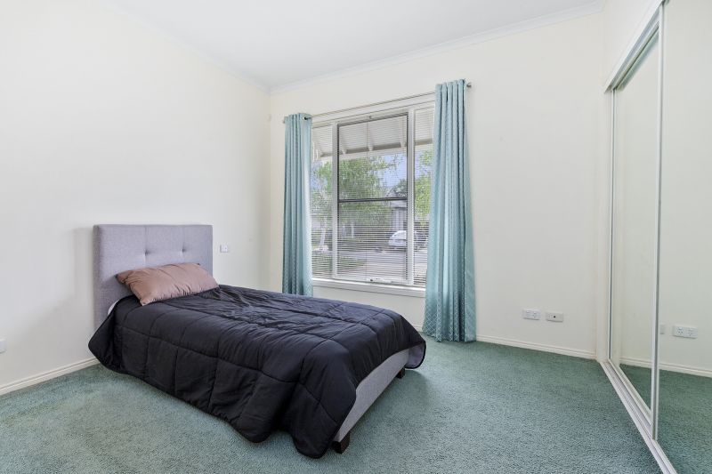 Charming Two-Bedroom Home with Beautiful Gardens