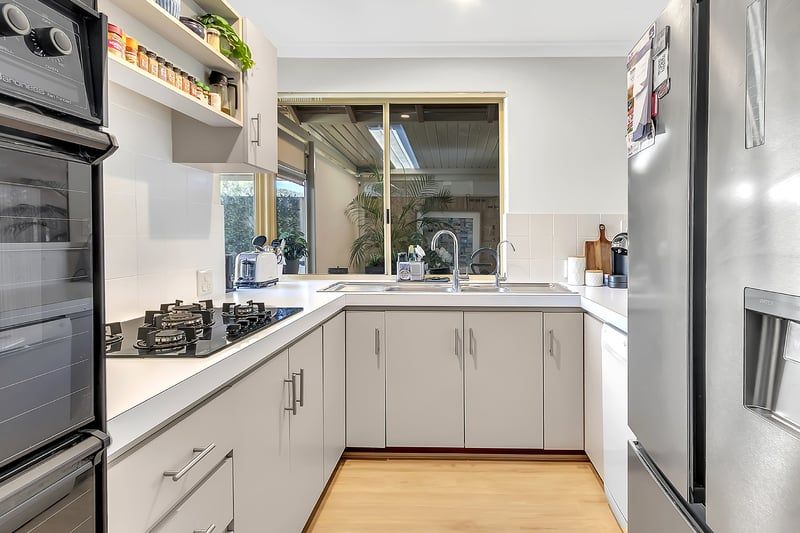 Sunny Yard and Vibrant Village Lifestyle