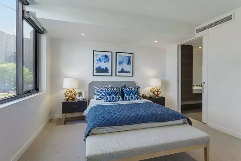 It's hardly downsizing with this three bedroom, 2 bathroom apartment in inner-city Melbourne