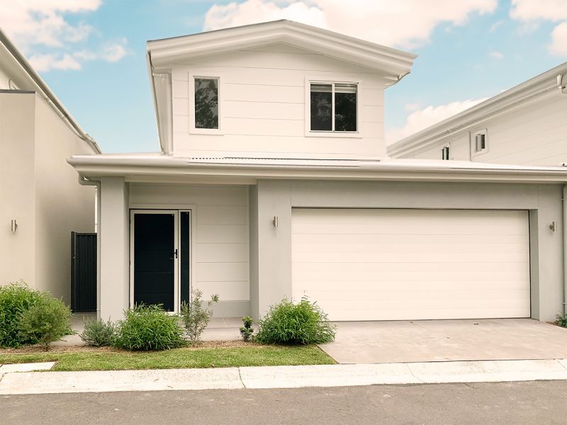 Nestled among beautifully landscaped grounds