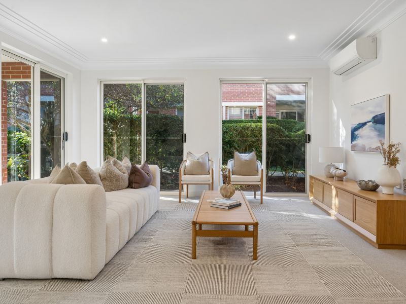 Contemporary three-bedroom apartment in a prime village setting
