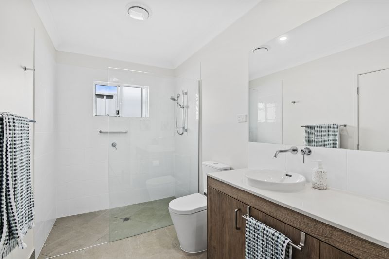 Elevated Home with Spacious Backyard and Modern Interior