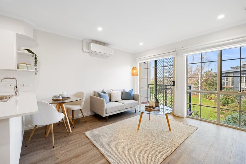 Stylish Upgraded Apartment in Prime Village Setting