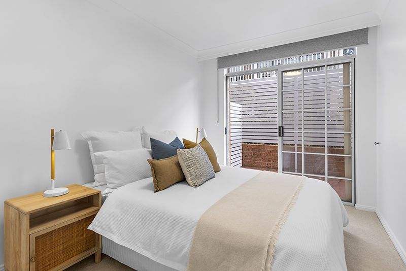 Beautifully renovated unit surrounded by lush gardens