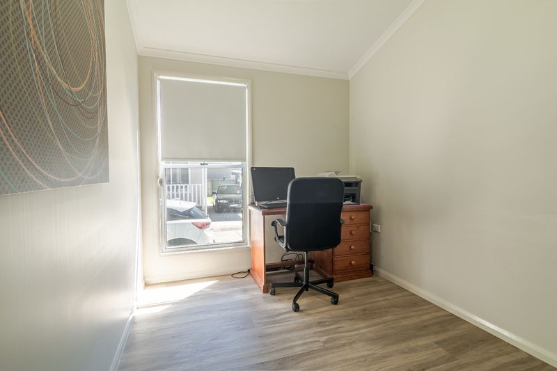 Downsize to this modern 2 bedroom plus full study home in popular over 55s living estate