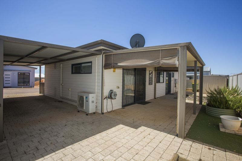 Open plan living situated on a large, elevated block.