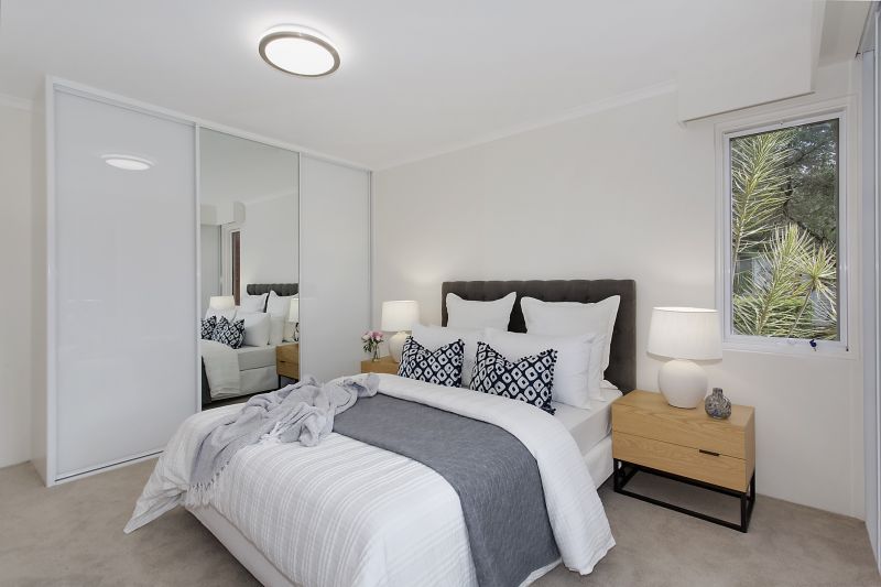 Serene two-bedroom haven overlooking lush forest