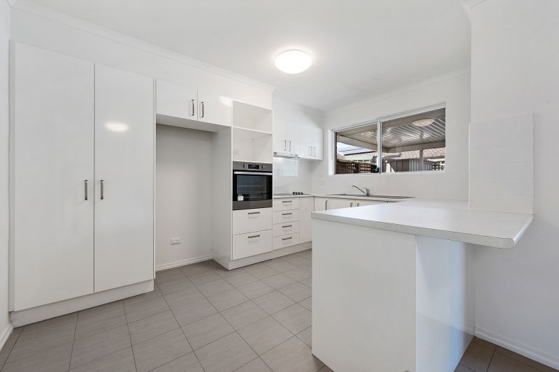 Modern home in tightly-held community