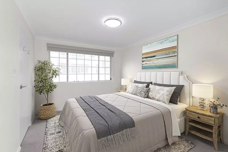 Immaculately maintained upper-level unit with district views and easy access ramp.