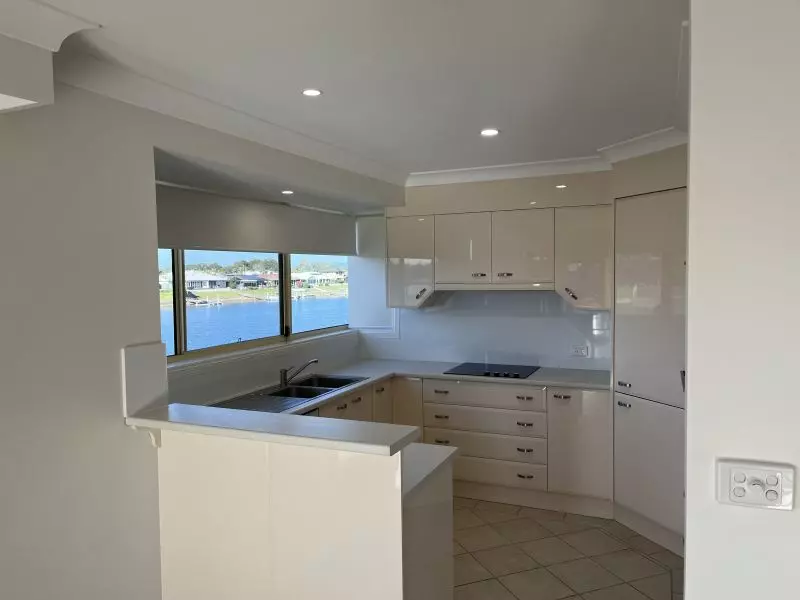 Under Offer -Stunning water view of the Governors Way canal from this spacious 3 bedroom unit