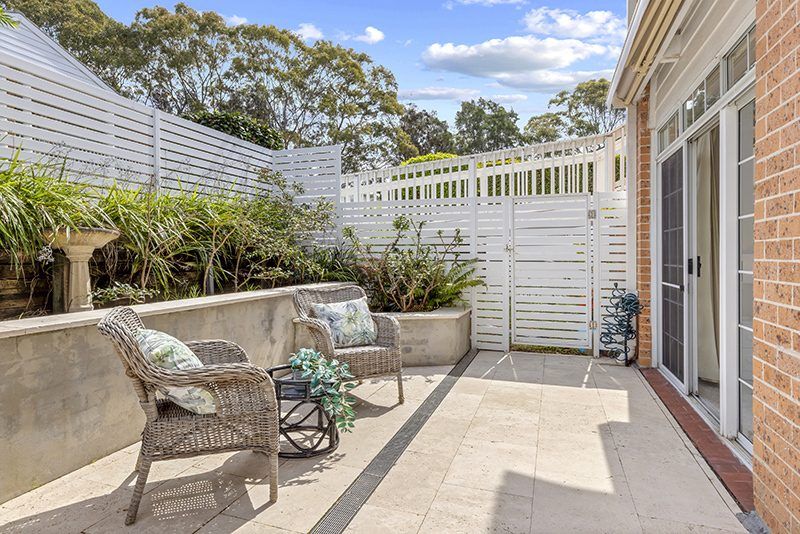 Ideally located, stylish ground floor unit near the Clubhouse with rear courtyard