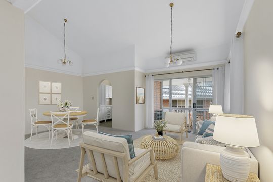Immaculately presented upper level unit with leafy garden views