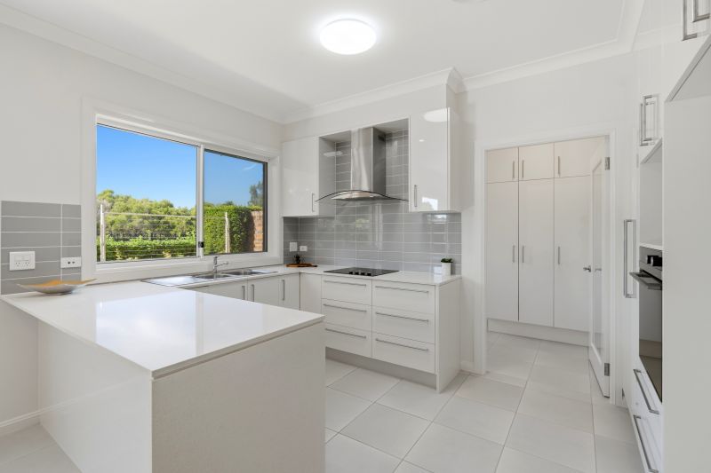 Comfort and privacy awaits in this modern retirement villa