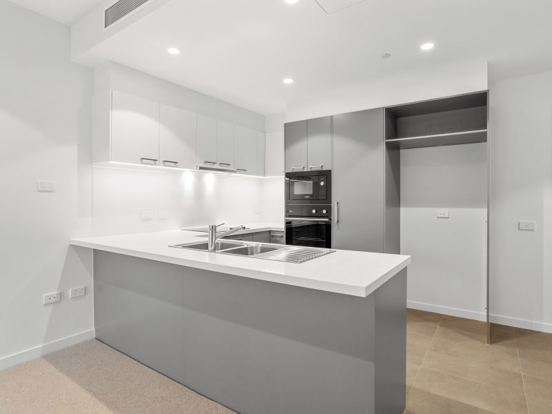 DEPOSIT TAKEN - Light-filled ground floor apartment with lagoon views!