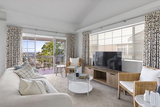 Beautifully presented unit close to clubhouse with district views.