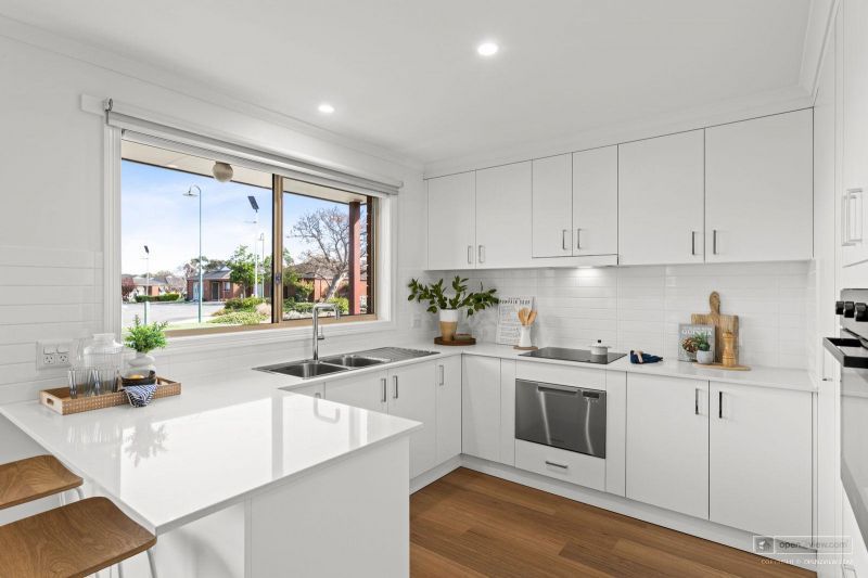 Beautifully Refurbished Two-Bedroom Home Opposite the Community Centre