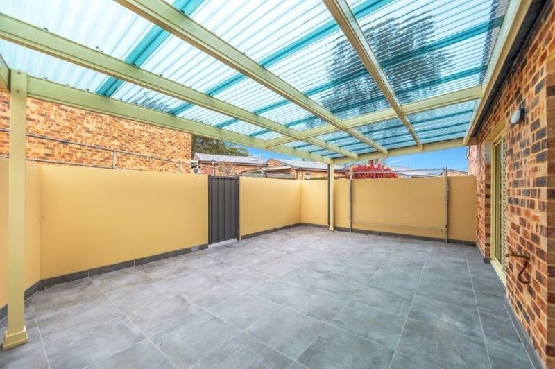 Modern, Spacious Living with Large Sunny Courtyard and Single Garage