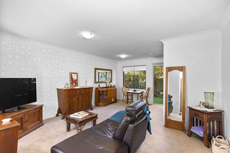 Beautifully presented two bedroom unit nestled in the centre of the village with large rear courtyard.