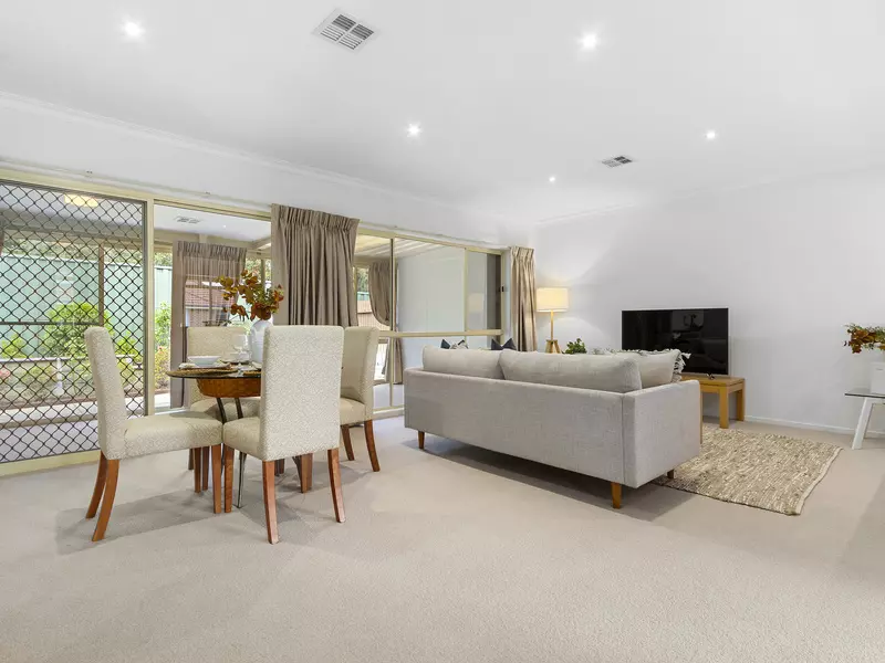Light-Filled Living with Sunroom and Private Courtyard