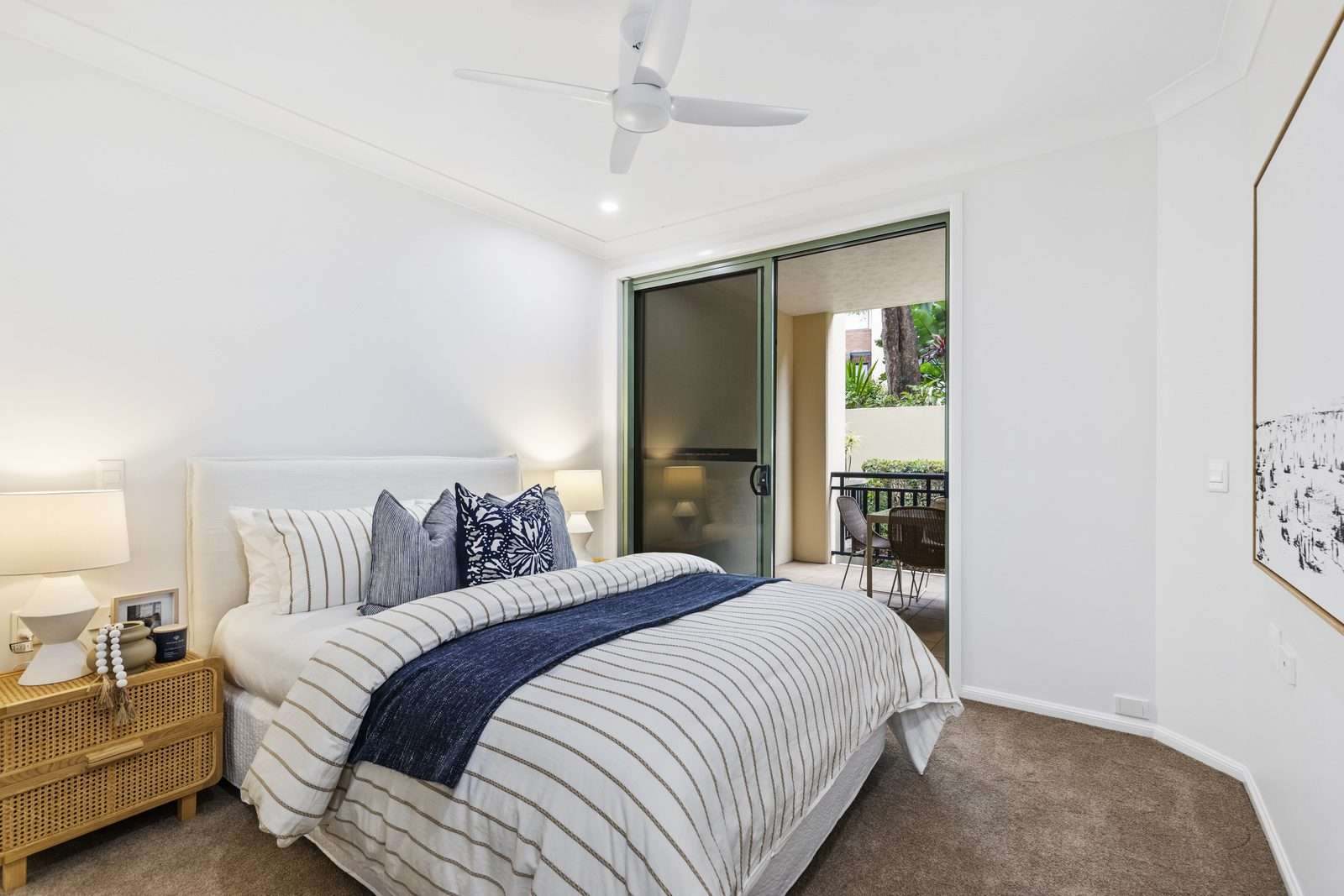 Modern one-bedroom apartment with large balcony.