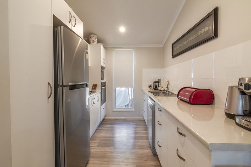 Downsize to this modern 2 bedroom plus full study home in popular over 55s living estate