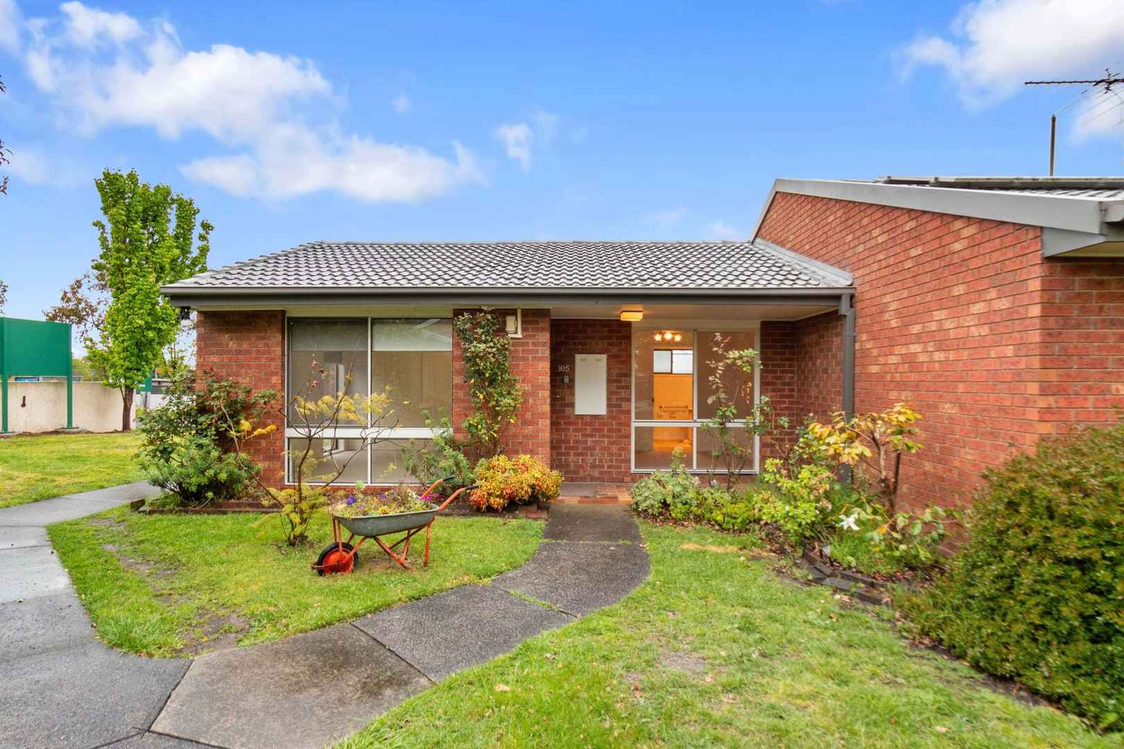 Private, Updated Unit with Courtyard in a Friendly Village Setting