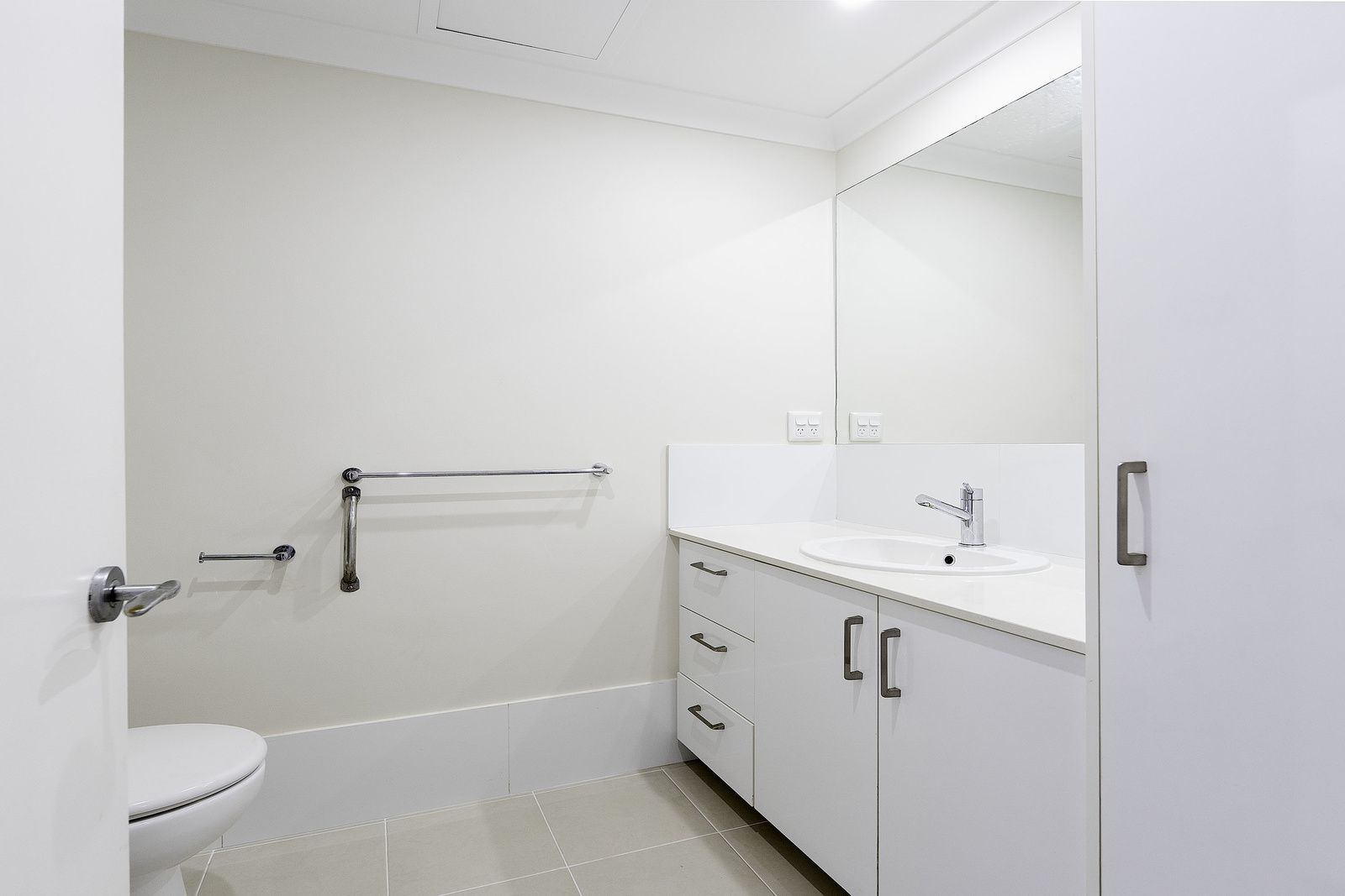 Bright corner apartment close to village amenities