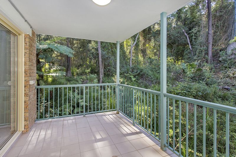 Peaceful north-easterly 2-bedroom residence embraced by greenery