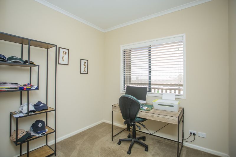 Open plan living situated on a large, elevated block.