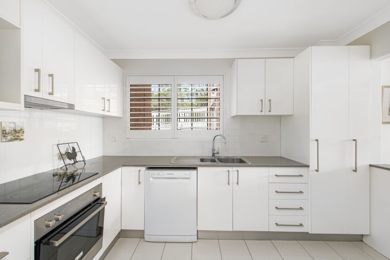 Centrally located, ground floor unit surrounded by lush gardens with large courtyard, close to clubhouse.