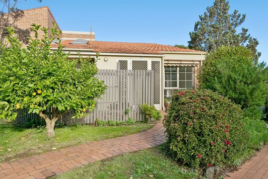 Elegantly Updated and Courtyard Charm